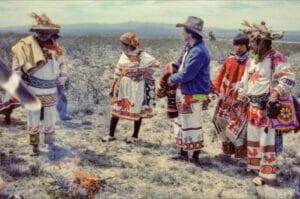 Huichol people standing in the high desert 